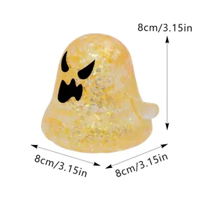 Vista detallada que muestra las dimensiones del juguete fantasma naranja de Halloween