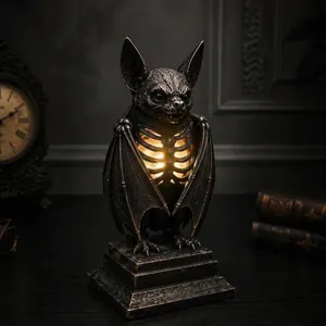 Detailed macro view of a gothic bat skeleton resin lamp for Halloween decor