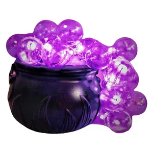 Halloween purple bubble LED lights in a vintage black witch cauldron desktop decoration