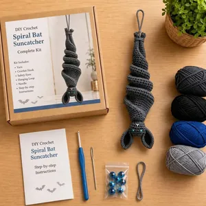 Complete DIY crochet kit for a Halloween spiral bat suncatcher on wooden background