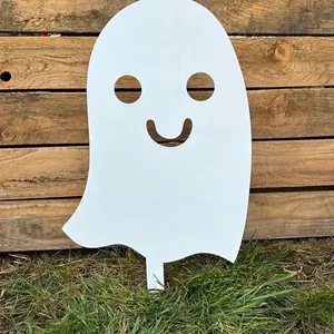 Decorative white ghost metal garden stake featuring a cute smiley face cut-out detail
