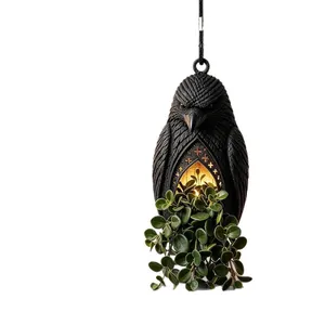Lanterna sospesa a forma di corvo gotico con aiuola integrata e luce calda decorativa