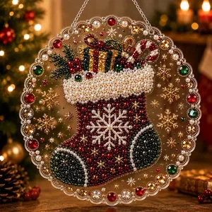 Macro detail of a 5D DIY diamond painting Christmas stocking ornament with sparkling beads.