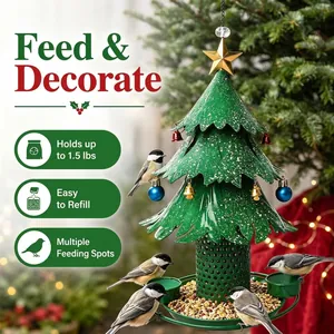 Outdoor Christmas tree shaped bird feeder with decorative ornaments and feeding tray
