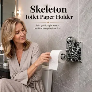 Gothic silver skeleton toilet paper holder wall mounted in a modern bathroom setting