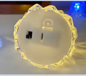 Bottom view of Christmas iceberg night light with battery compartment and power switch