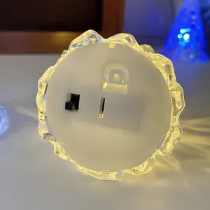 Bottom view of Christmas ice mountain night light with switch and battery compartment
