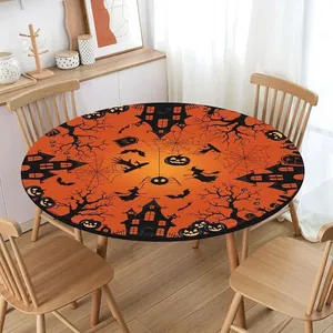 Detailansicht der runden Halloween-Tischdecke mit dem orangefarbenen Kürbismuster