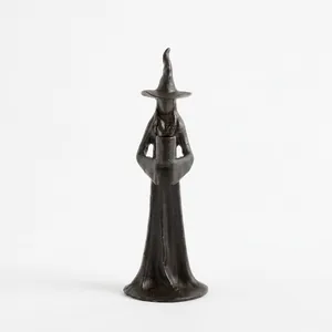 Handmade black resin witch figurine with pointed hat for spooky Halloween home decor
