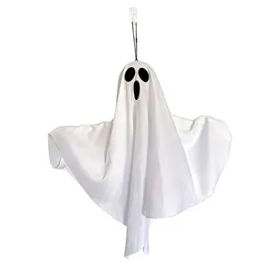 Detailed close-up view of a white fabric hanging ghost decoration for Halloween party