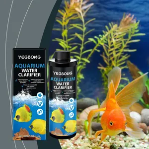 Aquarium water clarifier bottle and box against a clear fish tank with a goldfish