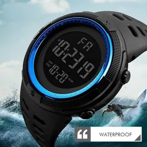 Close-up detail of waterproof sports digital watch featuring a large black LCD display