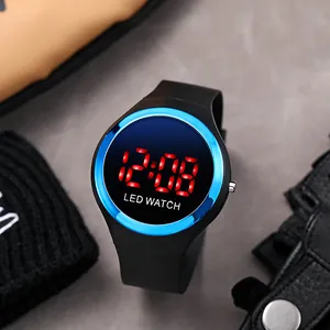 Detailed close-up view of a stylish children's LED digital watch with a blue metallic bezel.
