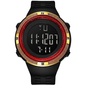 Close-up of a men's black digital sports watch with gold and red bezel