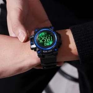 Close-up detail of a durable men's sport watch featuring a green digital backlight