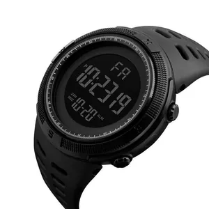 Macro detail of rugged black men's digital sports watch with durable silicone strap