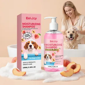 Close-up van EELJOY perzik hondenshampoo fles en doos met verse perzik en schuimdetail