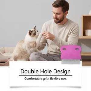 Detailed view of a purple double hole pet flea comb featuring stainless steel grooming teeth.
