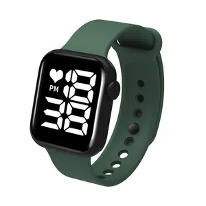 Close-up detail of a dark green LED digital watch with a stylish silicone wristband.