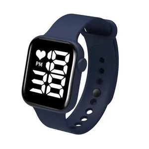 Close-up view of navy blue LED digital watch with heart icon and touch screen