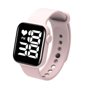 Detailed view of a stylish pink LED digital watch for kids with silicone strap