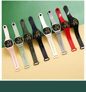 Detailed view of LED sports watches in multiple colors arranged on two-tone background