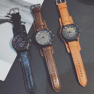 Muestra de tres elegantes relojes de cuarzo para hombre con esferas grandes y correas.