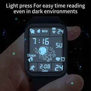 Detailed macro view of luminous digital watch screen featuring an astronaut design in darkness