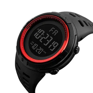 Close-up of professional black digital sports watch with red accent and large display