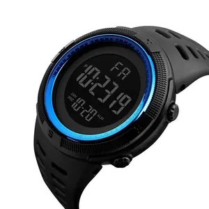 Detailed close-up of a black multifunctional digital sports watch with blue bezel