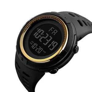 Close-up detail of a men's black digital sports watch with gold trim and large LCD display