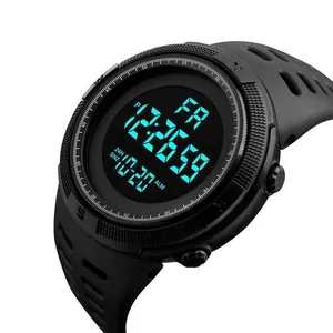 Detailed macro view of black digital sports watch with large LED display and date