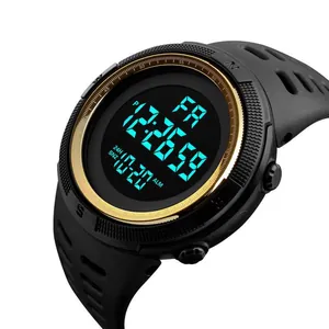 Macro view of black men's digital sports watch with golden inner bezel and clear LCD screen