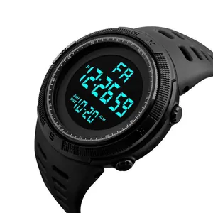 Close-up detail of a black digital sports watch showing clear time and date display