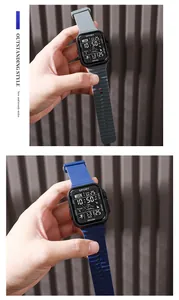 Close-up detail of multifunctional digital sports watch with gray and blue silicone straps