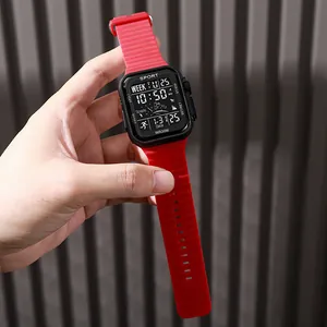 Red digital sports watch for outdoors featuring waterproof casing and luminous display