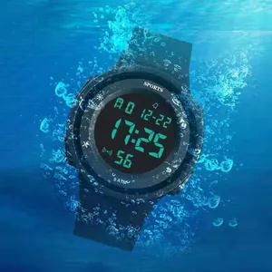 Professional waterproof digital sports watch with 5 ATM rating shown submerged in water