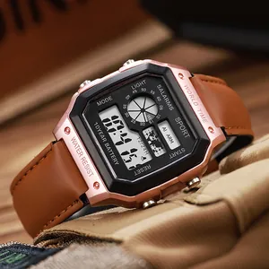 Primer plano de reloj digital oro rosa con correa de cuero marrón y mapa del mundo