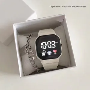 White digital watch with astronaut display in a minimalist gift box with bracelet