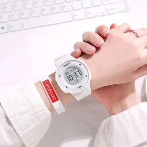 Macro view of a minimalist white digital sports watch for students on a female wrist