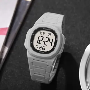 Close-up of SIKEZHUN grey digital sports watch with square luminous display for men.