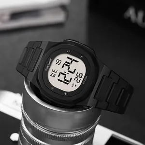 Close-up of a black outdoor sports digital watch with luminous square dial