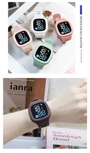 Detail view of square cartoon LED sports watches in multiple colors on wrist and display.