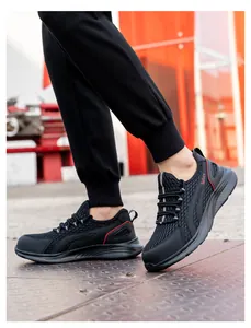 Detailed view of breathable mesh safety shoes with anti-smash and puncture-proof features.