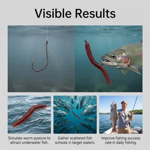 Realistischer roter Weichwurm-Angelköder zieht Fische mit sichtbarem Erfolg an.