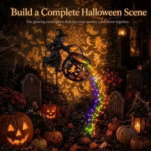 Close-up of Halloween witch cauldron garden light with flowing colorful LED fairy lights.