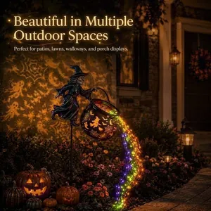Macro view of Halloween witch cauldron pouring out rainbow LED string lights in a garden.