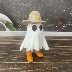 Detailed view of a white resin cowboy ghost figurine with a star hat for Halloween