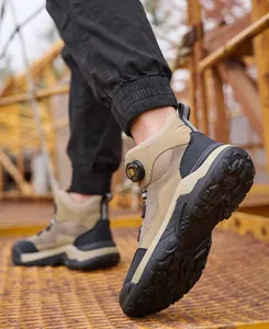 Macro view of men's steel toe safety boots featuring a convenient rotary dial lacing system