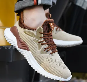 Zapatillas de seguridad transpirables en beige y marrón con suelas resistentes a pinchazos